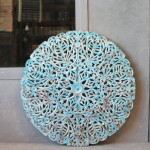 CARVED ROUND WOODEN DECORATIVE PANEL